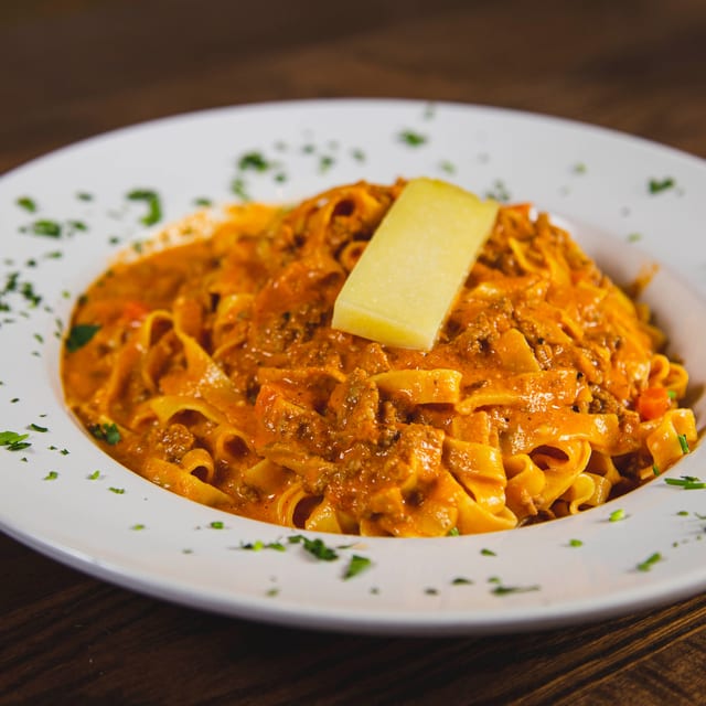 Half Tray Fettucine Bolognese.