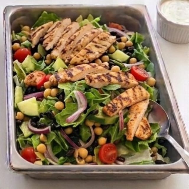Half Tray Basil Grilled Chicken Salad.
