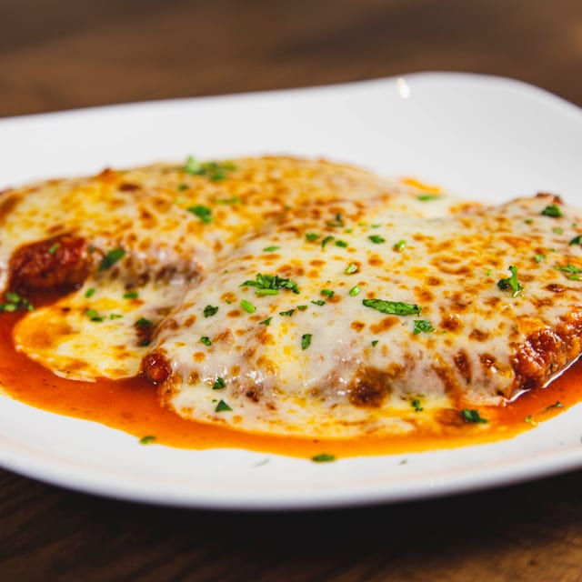 Half Tray Chicken Parm W/ Linguine.